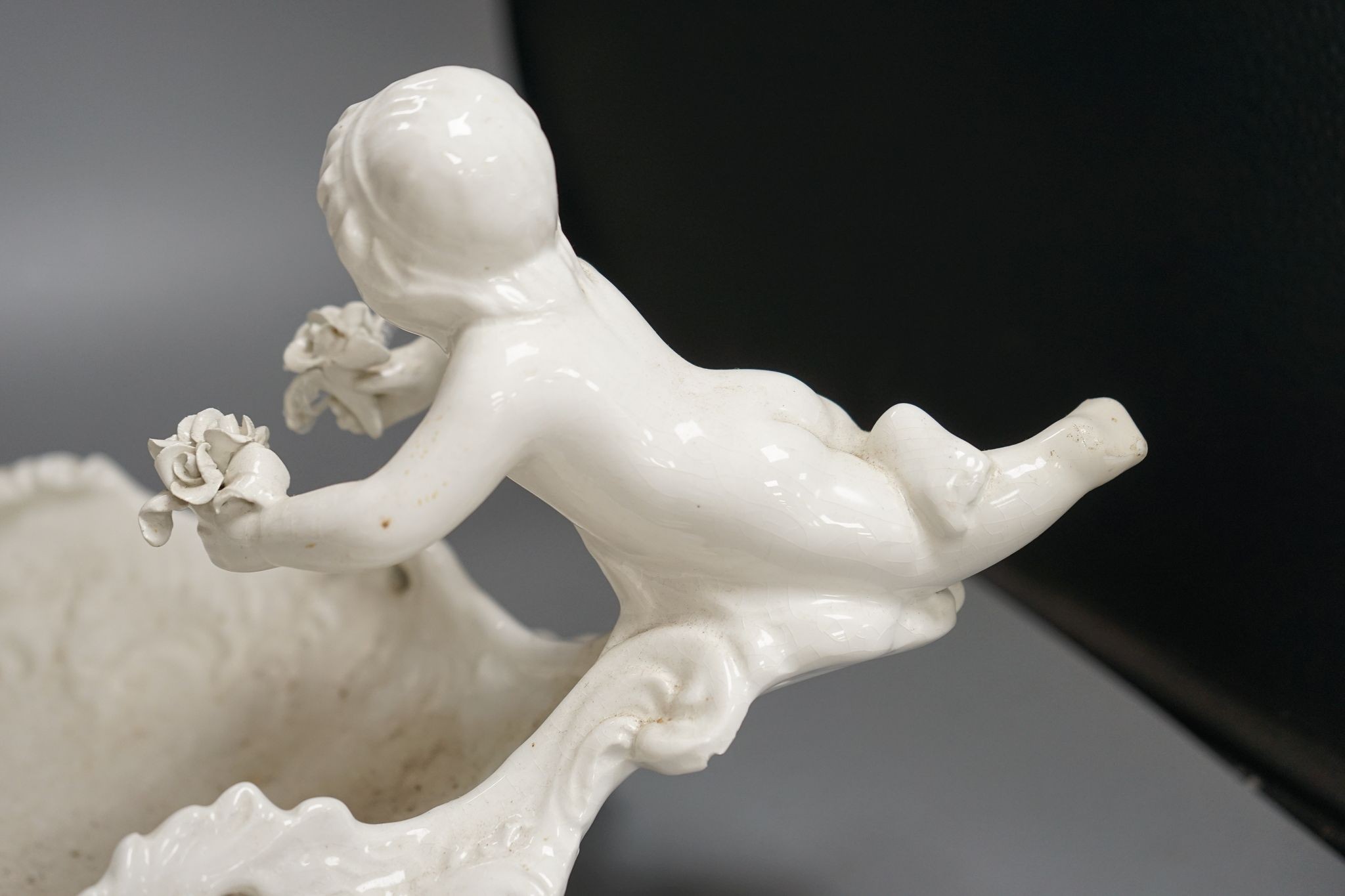 An Italian glazed pottery centrepiece, 63cm